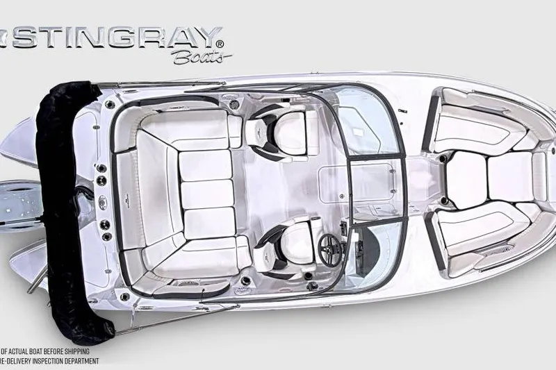 Slide: The Image of Top view of 2026 Stingray 211 DC boat with spacious seating and sleek design. - 7