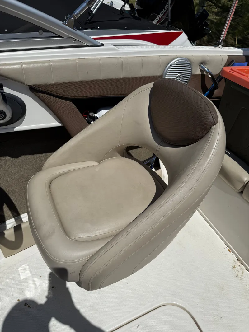 Slide: The Image of Interior of a 2015 Bayliner 185 boat, seating area. - 6