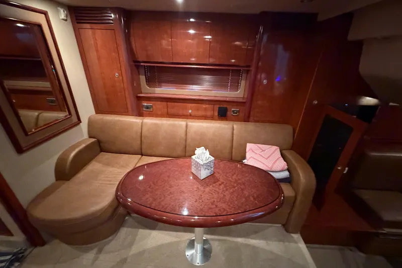 Slide: The Image of Luxurious interior of 2006 Sea Ray 40 Sundancer yacht with elegant wood finishes. - 13
