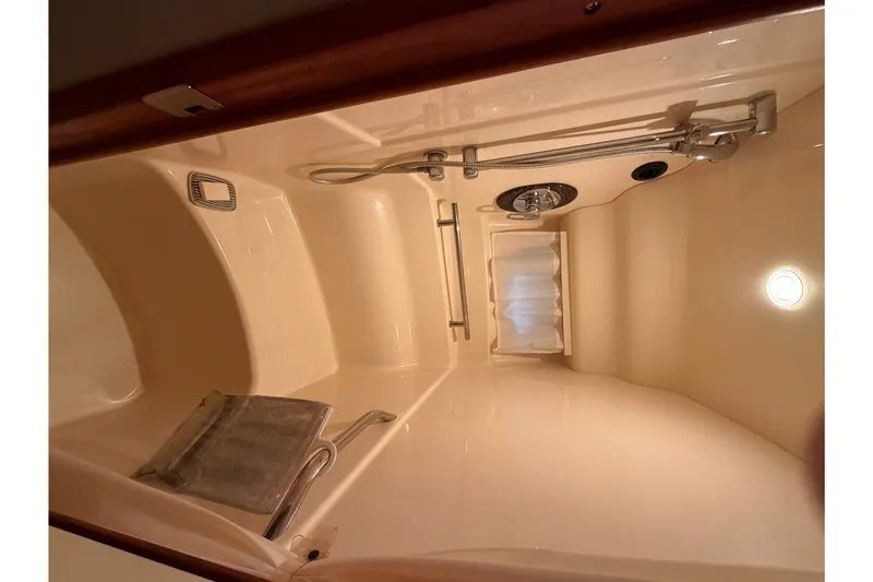 Slide: The Image of Interior of 2006 Sea Ray 40 Sundancer yacht bathroom with shower and light. - 21