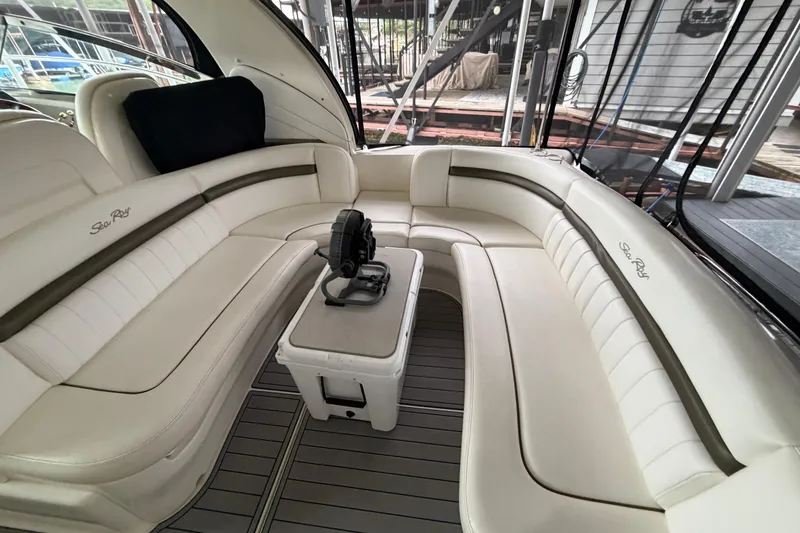 Slide: The Image of Luxurious interior of 2006 Sea Ray 40 Sundancer yacht with plush seating and table. - 9