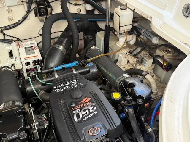 Slide: The Image of Engine compartment of a 2007 Sea Ray 320 Sundancer boat, featuring a 350 MPI Horizon engine. - 23