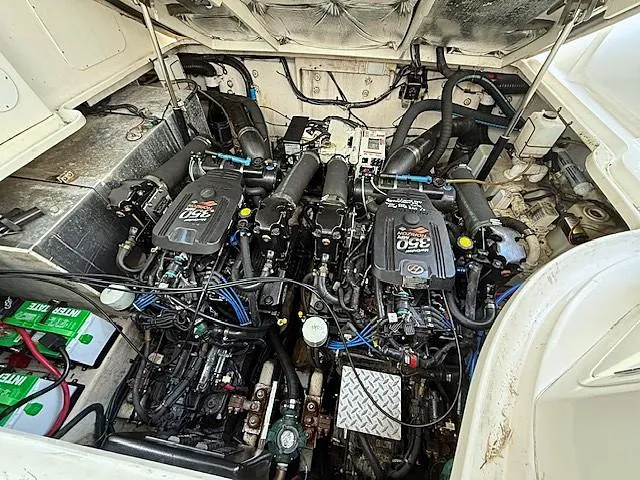 Slide: The Image of Engine compartment of a 2007 Sea Ray 320 Sundancer with twin 350 horsepower engines. - 24