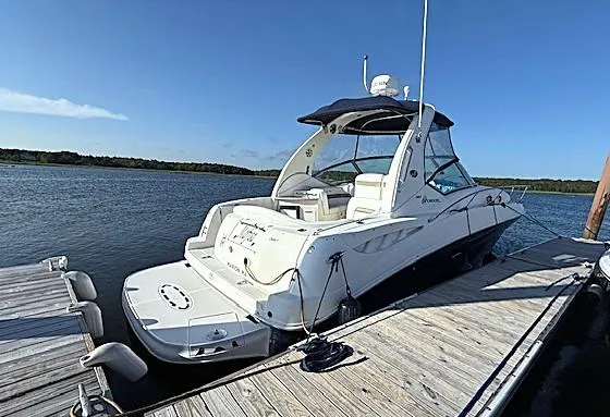 Slide: The Image of 2007 Sea Ray 320 Sundancer docked on a sunny day. - 3