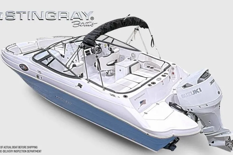 Slide: The Image of 2026 Stingray 231 DC boat with Suzuki 300 engine, featuring sleek design and spacious seating. - 3