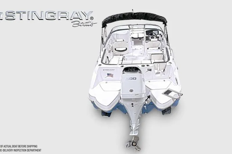 Slide: The Image of 2026 Stingray 231 DC boat, top view, showcasing sleek design and spacious interior. - 4