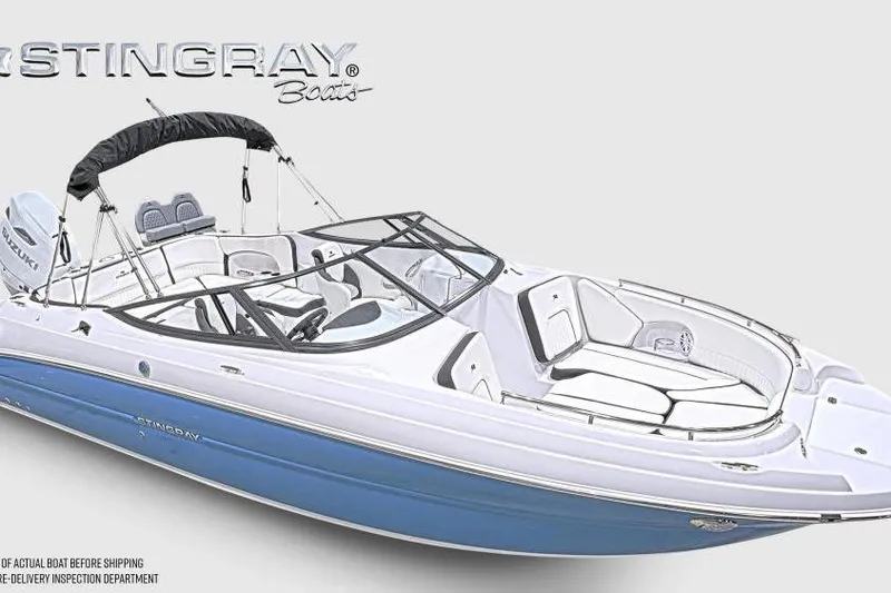 Slide: The Image of 2026 Stingray 231 DC boat with sleek design and blue hull. - 5