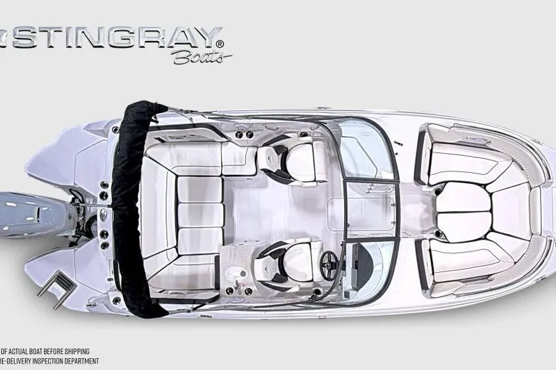 Slide: The Image of Top view of 2026 Stingray 231 DC boat with spacious seating and sleek design. - 7