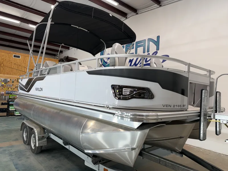 Slide: The Image of 2026 Avalon Venture 85 Quad Fish pontoon boat in showroom. - 15