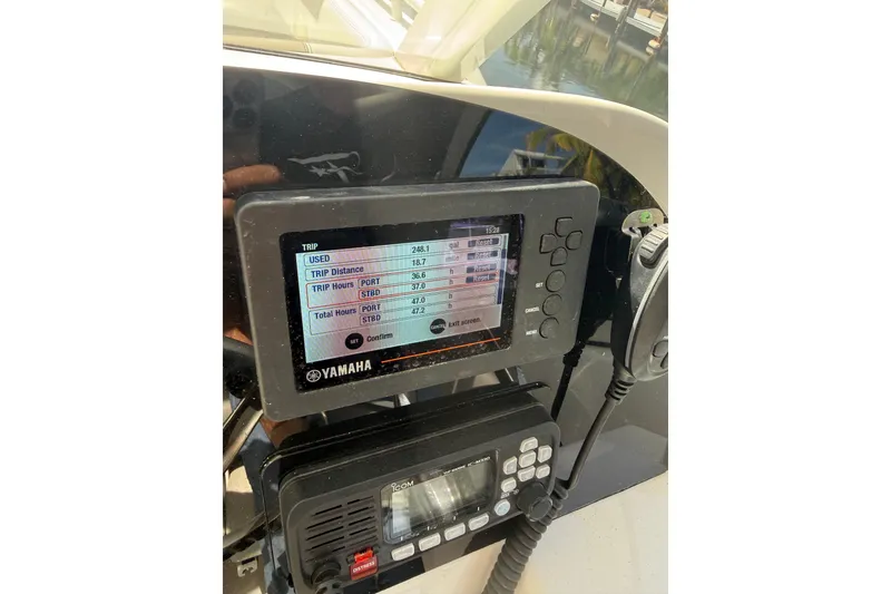 Slide: The Image of Yamaha display on 2023 World Cat 255 DC boat showing trip data and fuel usage. - 10