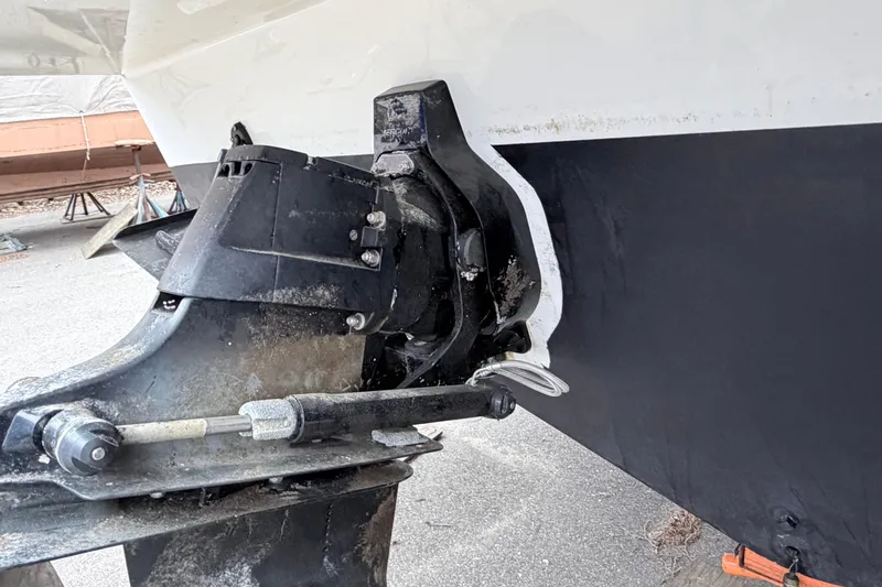 Slide: The Image of 2008 Sea Ray Sundancer 330 boat stern drive detail, showing mechanical components and hull. - 36