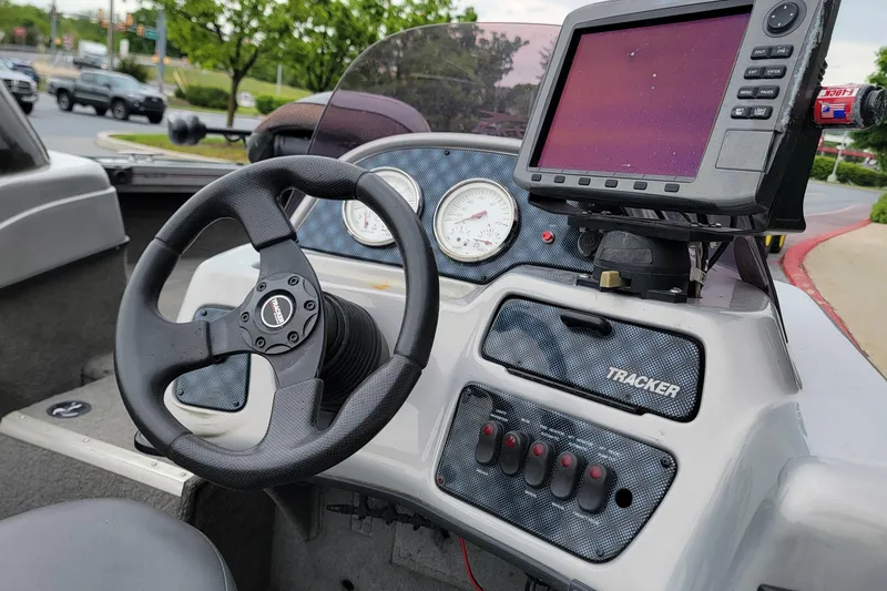 Slide: The Image of Steering console of a 2006 Tracker Targa 185 SC boat with gauges and navigation system. - 6