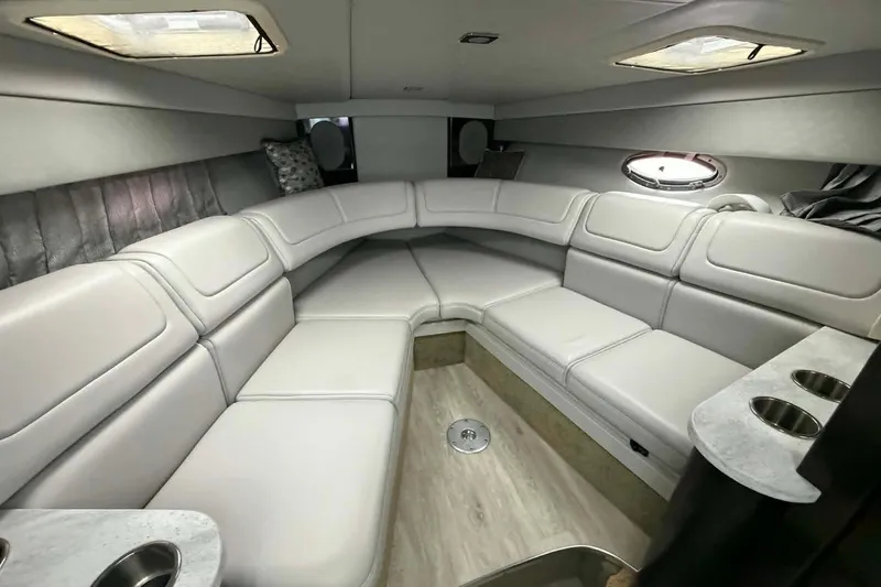 Slide: The Image of Luxurious interior of a 2018 Formula 310 Sun Sport boat with plush seating. - 12