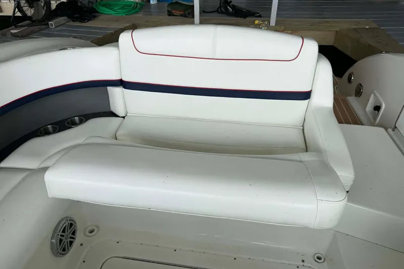 Slide: The Image of 2018 Formula 310 Sun Sport boat interior with white cushioned seating. - 19