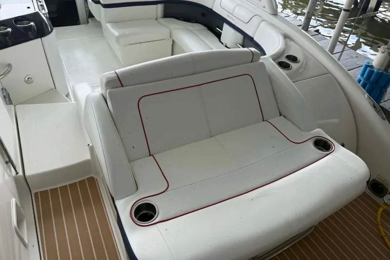 Slide: The Image of 2018 Formula 310 Sun Sport boat interior with white seating and cup holders. - 21