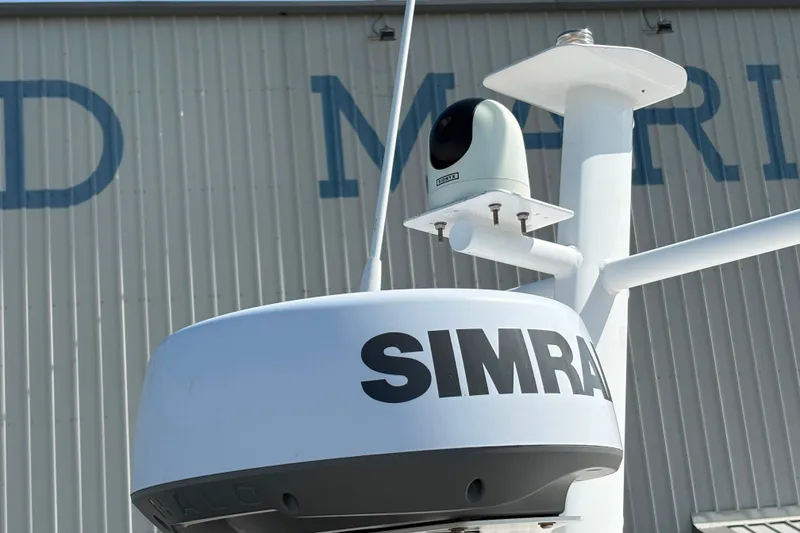 Slide: The Image of 2024 Axopar 37 XC Cross Cabin radar and camera equipment on display. - 9