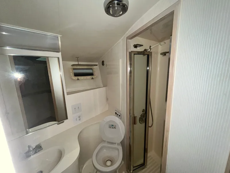 Slide: The Image of Interior view of a 1991 Hatteras 40 DC yacht bathroom. - 10