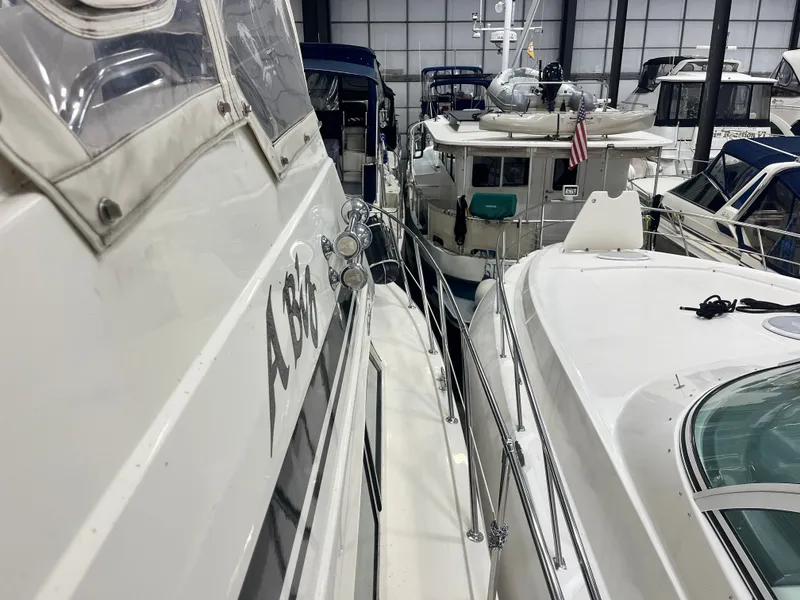 Slide: The Image of Boats docked in marina, Hatteras 40 DC, 1991 model. - 14