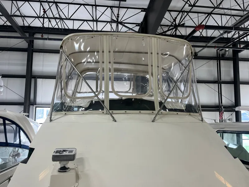 Slide: The Image of 1991 Hatteras 40 DC boat in storage facility, front view. - 15