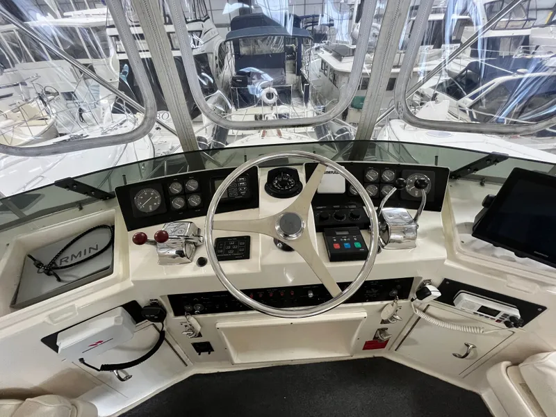Slide: The Image of 1991 Hatteras 40 DC yacht helm with navigation equipment. - 2