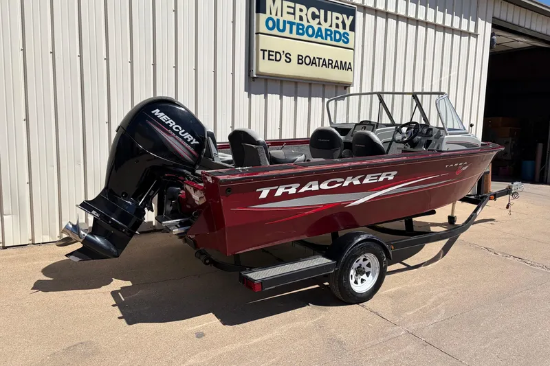 The Image of 2016 Bass Tracker Tournament V-18 boat with Mercury outboard motor at dealership. - 0