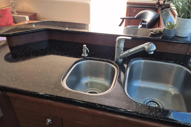 Slide: The Image of Luxury yacht kitchen with dual sinks and modern faucet, Meridian 490 Pilothouse 2008. - 21