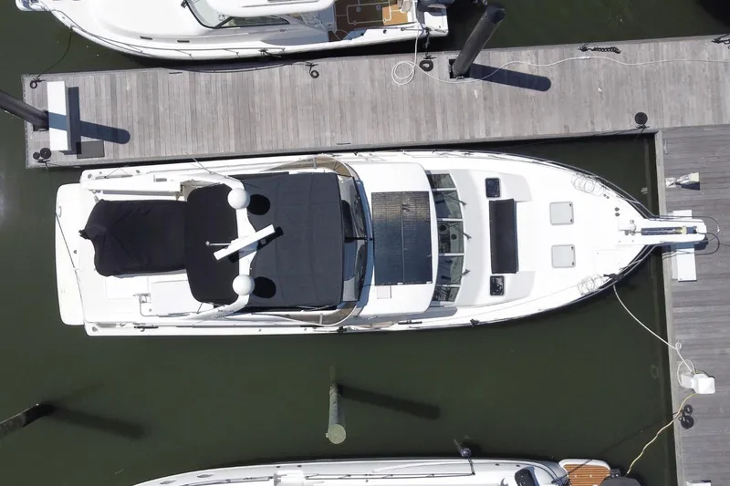 Slide: The Image of Aerial view of a 2008 Meridian 490 Pilothouse yacht docked at a marina. - 30