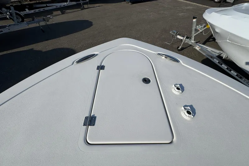 Slide: The Image of 2026 Tidewater 232 SS boat deck with storage hatch and fittings. - 17