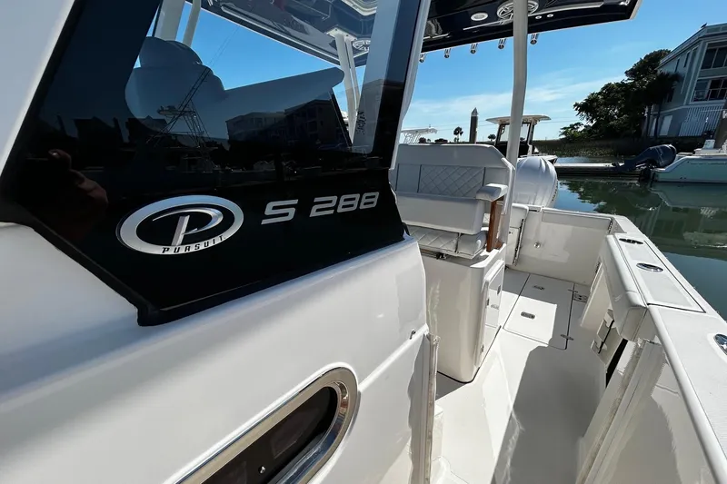 Slide: The Image of 2024 Pursuit S 288 Sport boat interior, showcasing sleek design and modern features. - 7