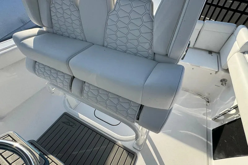 Slide: The Image of 2026 Tidewater 232 LXF boat interior with stylish seating and modern design. - 10