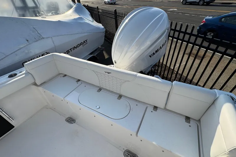 Slide: The Image of 2026 Tidewater 232 LXF boat with Yamaha engine, featuring spacious seating and sleek design. - 3