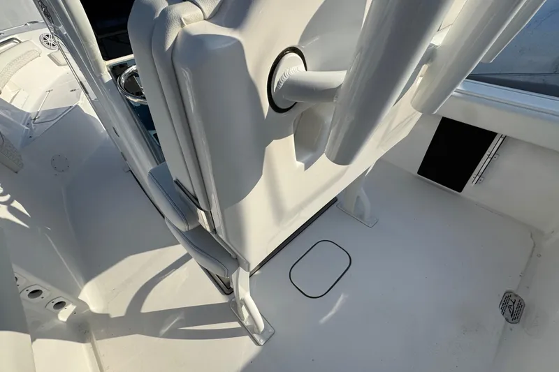 Slide: The Image of 2026 Tidewater 232 LXF boat interior, featuring sleek white seating and modern design elements. - 5