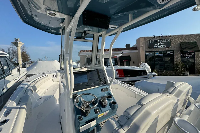 Slide: The Image of 2026 Tidewater 232 LXF boat interior at Blue Marlin Boats dealership. - 8