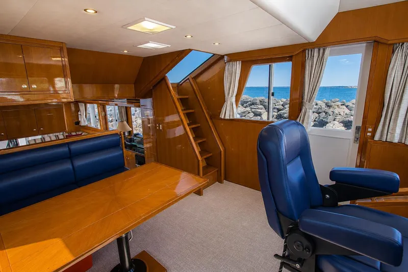 Slide: The Image of Luxurious interior of 2003 Jefferson Pilothouse 57 yacht with ocean view. - 59