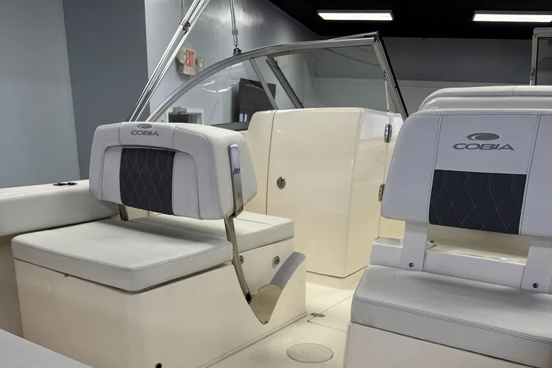 Slide: The Image of Interior of the 2024 Cobia 220 Dual Console boat. - 8