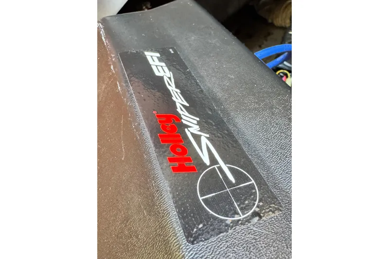 Slide: The Image of Sticker on a 1998 Luhrs Tournament 320 Convertible featuring Holley Sniper EFI logo. - 26