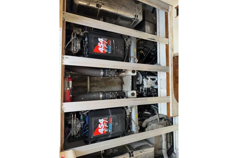 Slide: The Image of Engine compartment of a 1998 Luhrs Tournament 320 Convertible boat. - 29