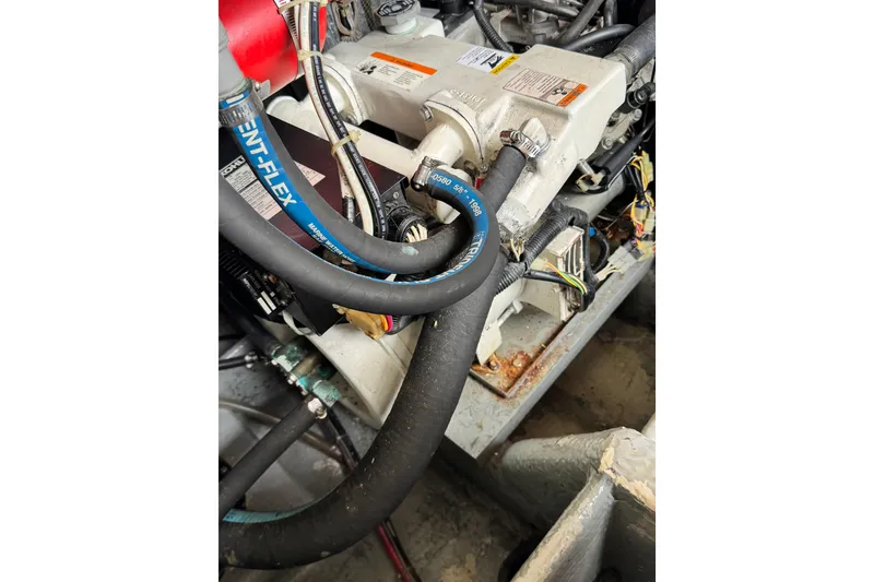 Slide: The Image of Engine compartment of a 1998 Luhrs Tournament 320 Convertible boat. - 30