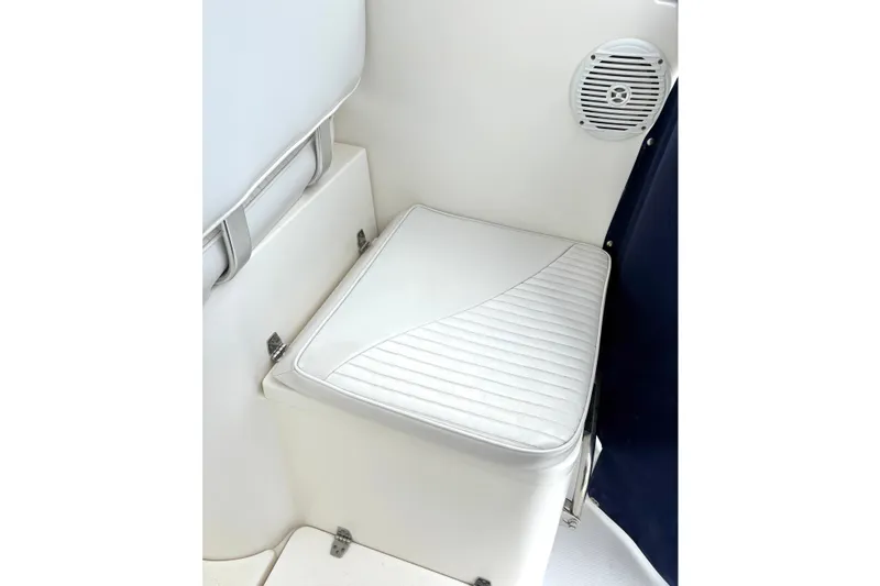 Slide: The Image of 2008 Seaswirl Striper 2901 Walkaround O/B boat seat with speaker detail. - 6