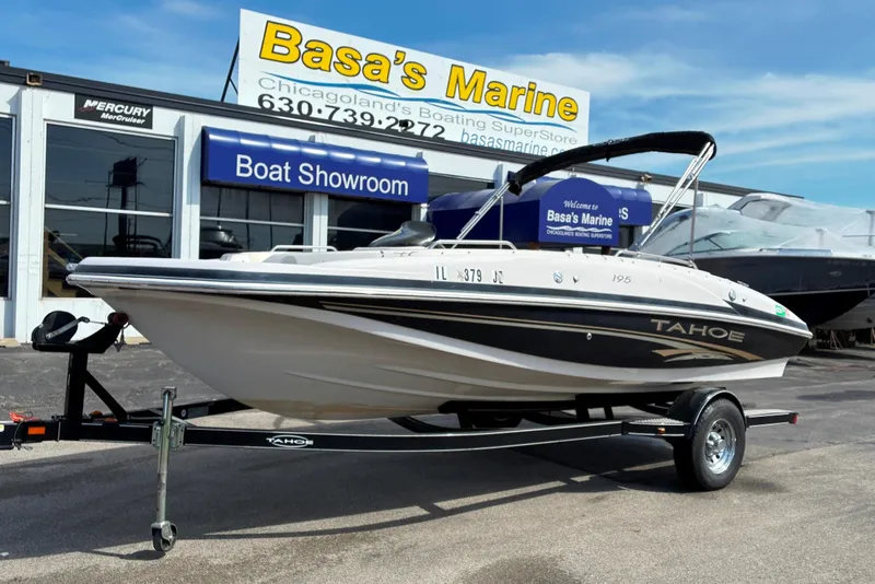 The Image of 2006 Tahoe 195 I/O boat on trailer at Basa's Marine showroom. - 0