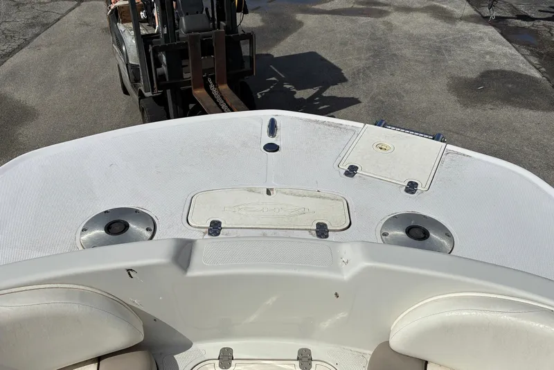 Slide: The Image of 2006 Tahoe 195 I/O boat deck with seating and storage compartments. - 4