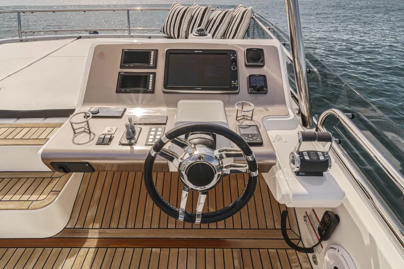 Slide: The Image of Helm of 2016 Galeon 640 Fly yacht with modern navigation equipment. - 19