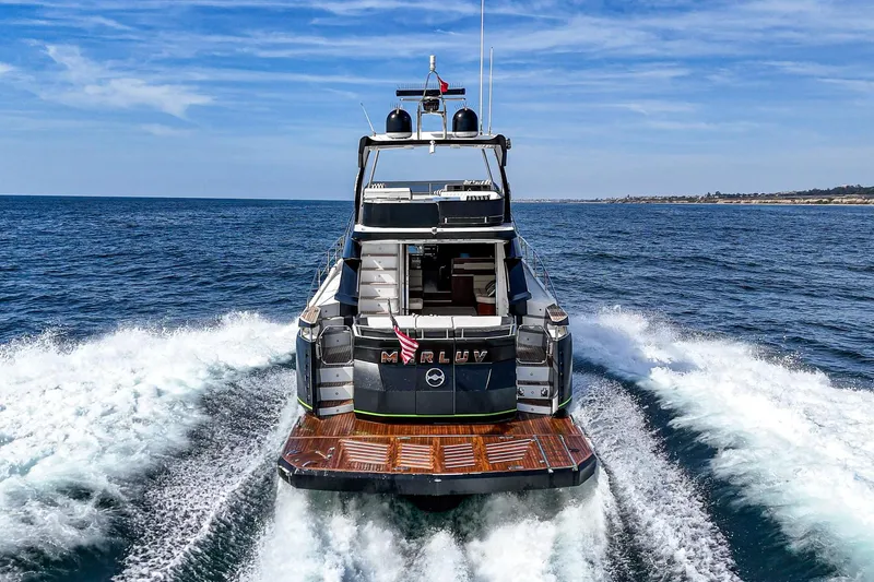 Slide: The Image of Galeon 640 Fly 2016 yacht cruising on open sea, rear view. - 27