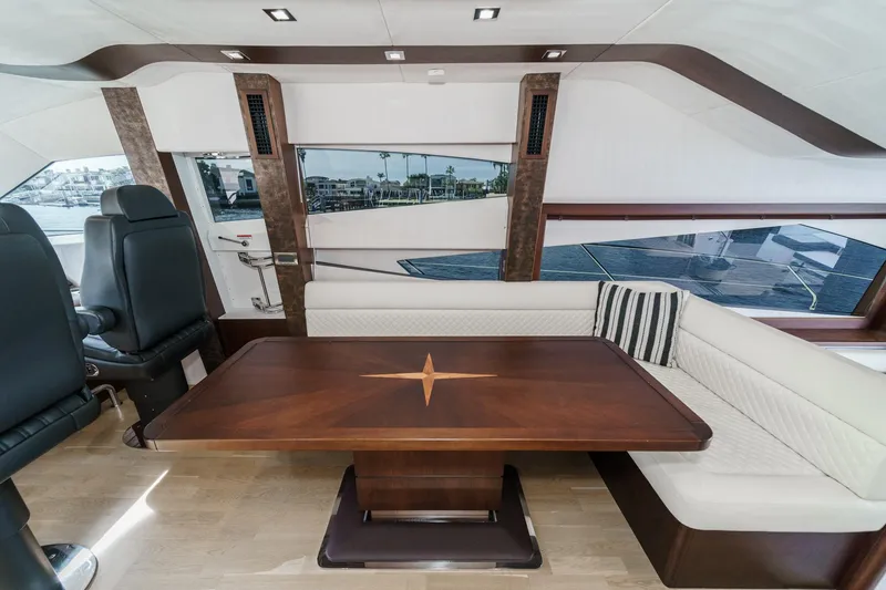 Slide: The Image of Interior of 2016 Galeon 640 Fly yacht with luxurious wooden table. - 37