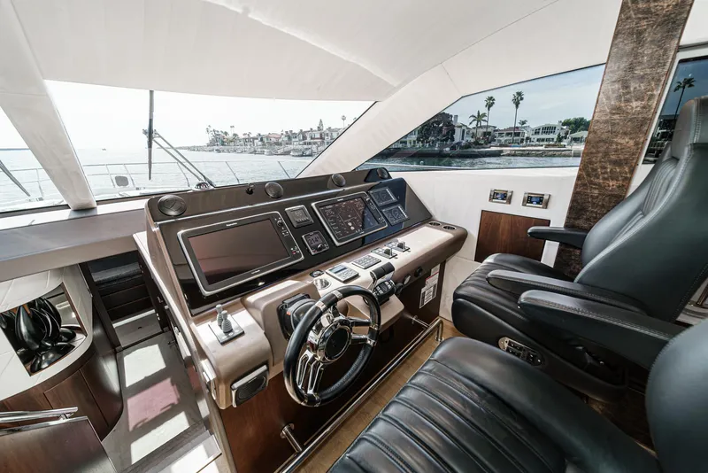 Slide: The Image of Interior view of a 2016 Galeon 640 Fly yacht helm station. - 42