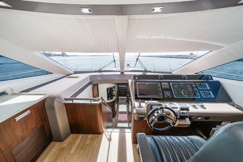 Slide: The Image of Interior view of 2016 Galeon 640 Fly yacht cockpit. - 43