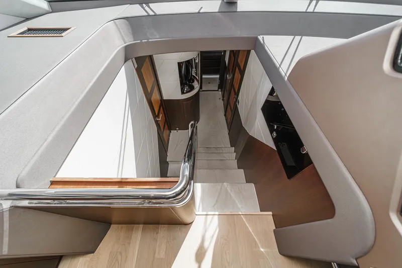 Slide: The Image of Interior of Galeon 640 Fly yacht, staircase view, year 2016. - 44