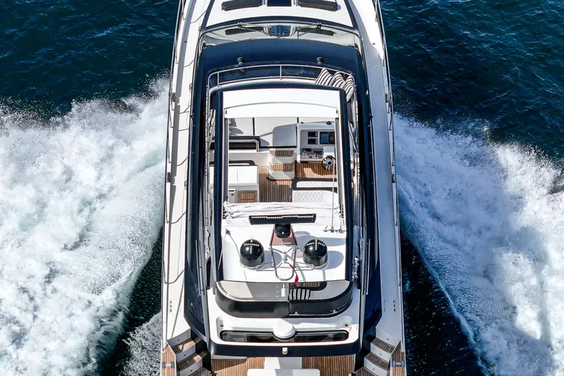 Slide: The Image of Aerial view of 2016 Galeon 640 Fly yacht cruising on water. - 12