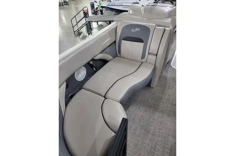 Slide: The Image of 2024 Barletta Corsa 23UA boat interior with luxurious seating and modern design. - 2