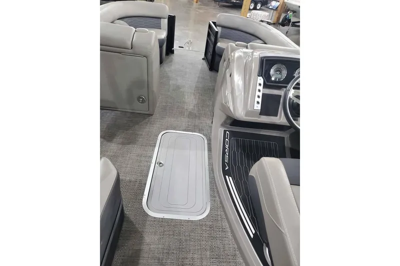 Slide: The Image of 2024 Barletta Corsa 23UA interior with sleek dashboard and comfortable seating. - 6